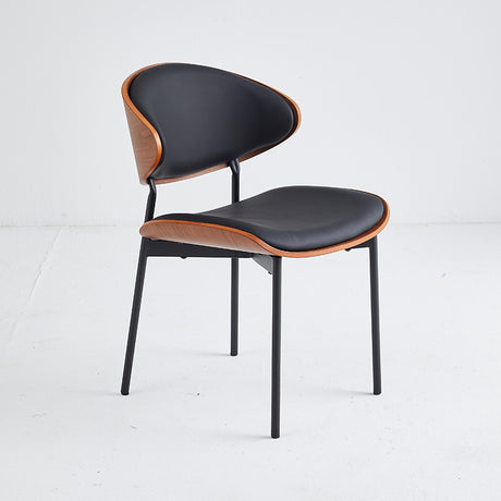 Commercial-grade black restaurant chair with wood accent and durable vinyl upholstery, ideal for heavy use.