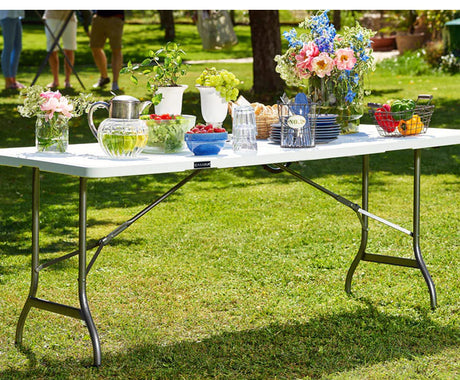 Folding banquet table 30″ x 72″ with durable plastic top. Lightweight, easy to set up, and perfect for events, parties, and commercial use.